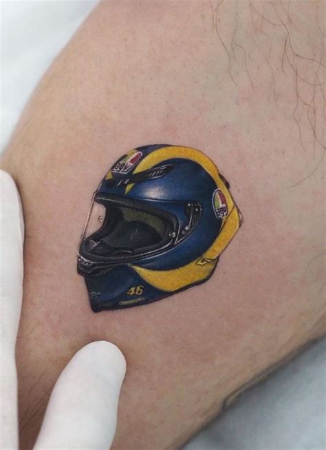 Helmet Tattoos Designs And Ideas Page 8 E T Tattoo Helmet Tattoo Eagle Tattoo Samoan Tattoo