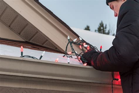 How To Hang Christmas Lights On Gutters Safely And Easily Eufy Us