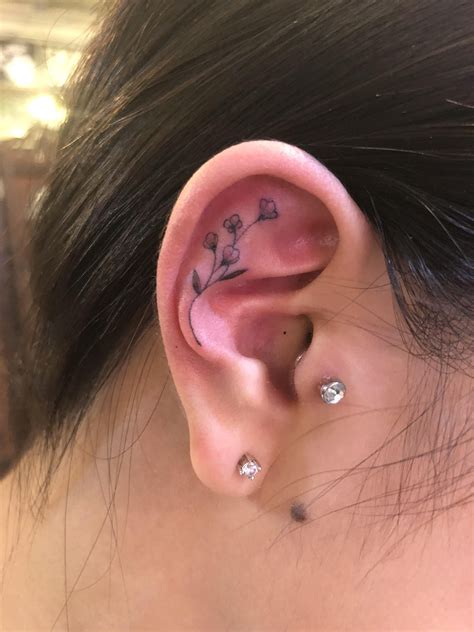 In Ear Tattoo Designs to Inspire Your Next Ink