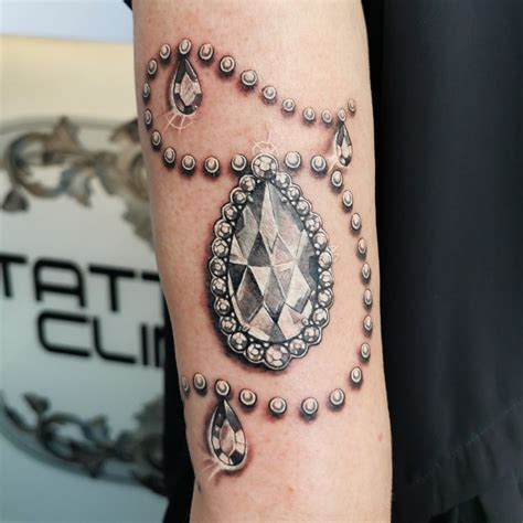 10 Beautiful Jewellery Tattoo Designs to Try