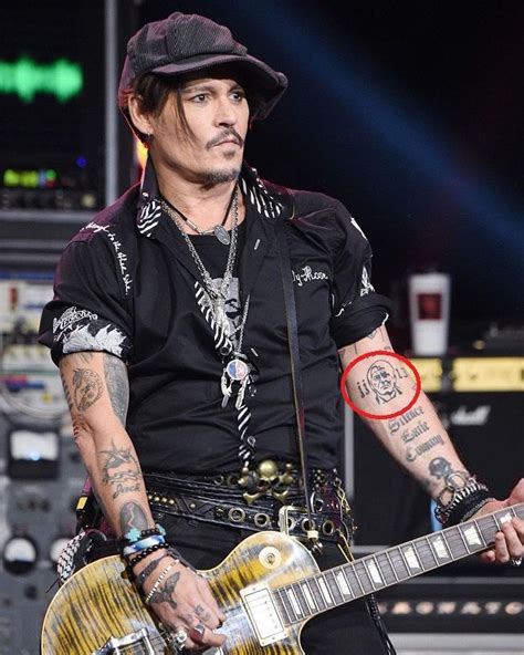 Johnny Depp Tattoos Arm