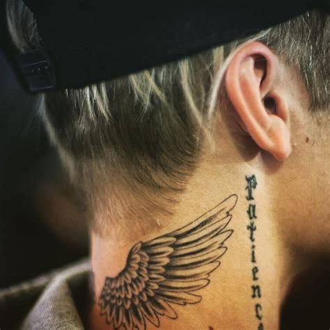 Justin Bieber S Wings Tattoo On The Back Of His Neck