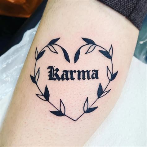 10 Karma Tattoo Designs to Balance Your Energy