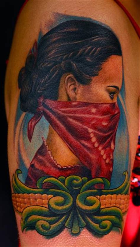 Latino Girl Tattoo On Arm Tattoo Designs Tattoo Pictures