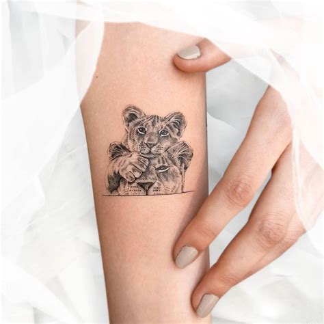 Lion Cub Tattoo Lion And Lioness Tattoo Lioness Tattoo Design Cubs