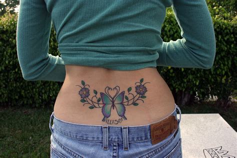 Lower Back Butterfly Flower Tattoo