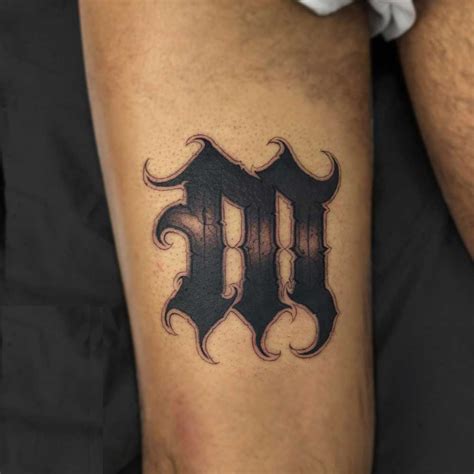 12 Majestic M Letter Tattoo Designs