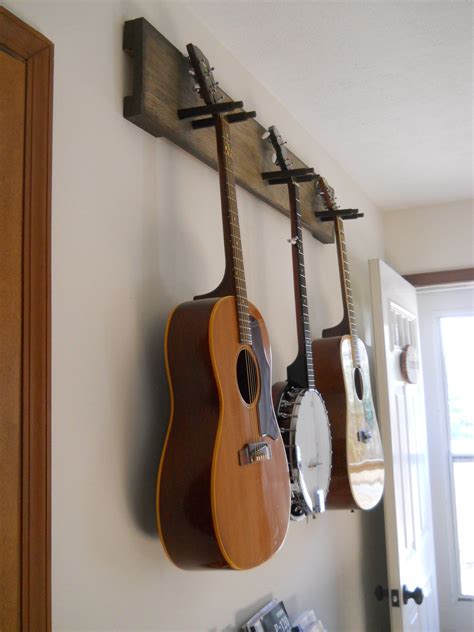 Make It Easy To Do Your Thing Diy Guitar Hanger Guitar Hanger Diy