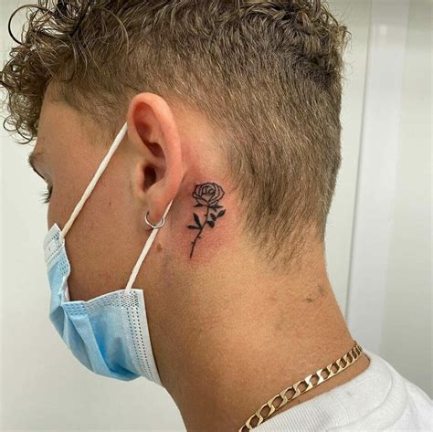 Tattoos Behind the Ear for Men: Designs and Ideas