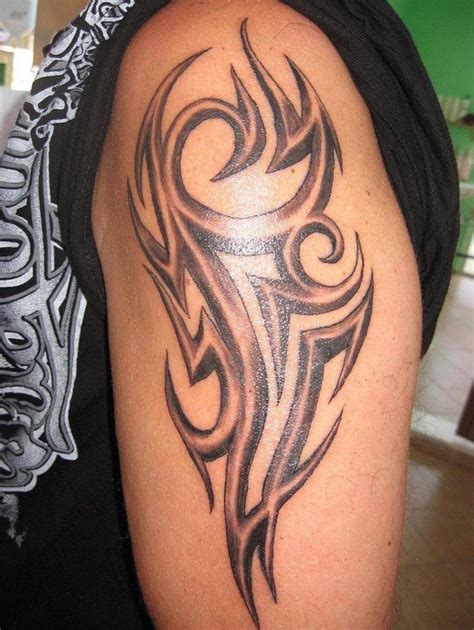 20 Bold Male Tribal Tattoo Designs