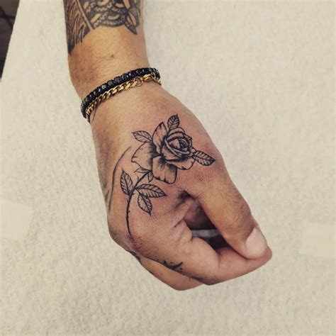 10 Rose Hand Tattoo Designs for Men