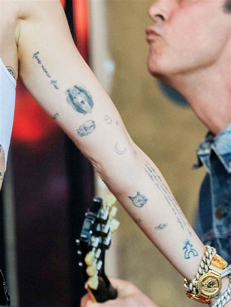 Miley Cyrus Tattoos Arm