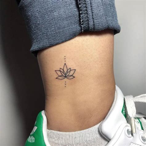 Minimalist Lotus Flower Tattoo