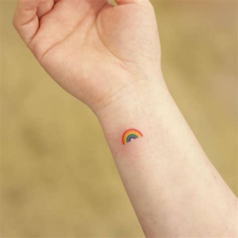 Minimalist Rainbow Tattoo On The Wrist