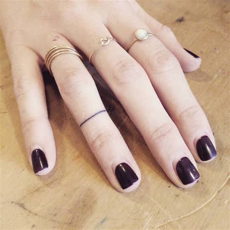 Minimalist Ring Tattoo On The Right Ring Finger