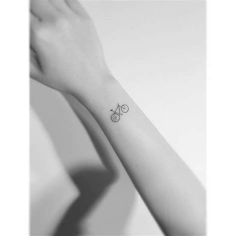 Minimalistic Bike Tattoo Located On The Wrist