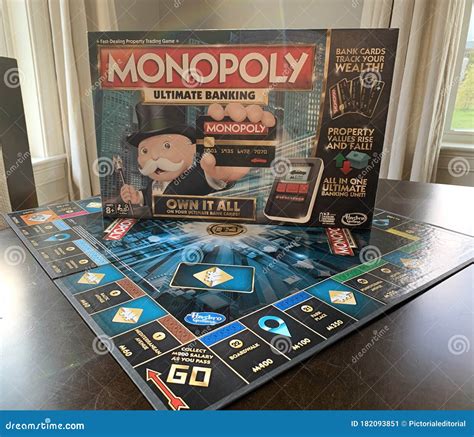 Monopoly Ultimate Banking Game Board And Box Editorial Photo Image Of