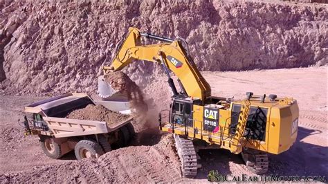 Mountain Removal 101 You Bring In A Caterpillar 6015B And 777 S Youtube