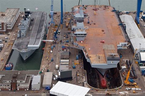 New Uk Qec Aircraft Carrier Alongside Old Uk Illustrious Aircraft