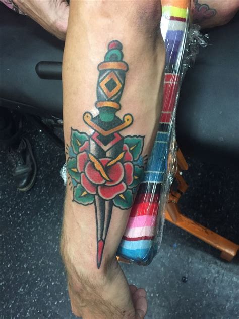 Old School Traditional Dagger Through Rose Tattoo By Franz Stefanik