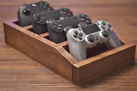 Organize Your Video Game Controllers These Stands Fit Perfectly Atop