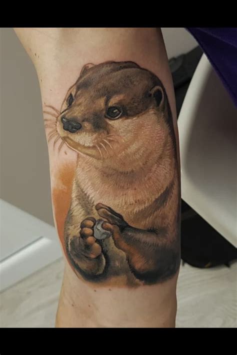 5 Meaningful Otter Tattoo Designs