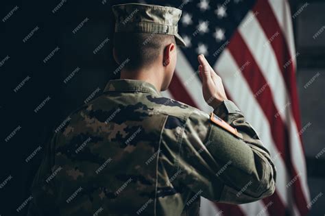 Premium Ai Image An American Soldier Salutes In Front Of The American Flag