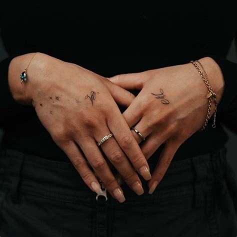 7 Pretty Hand Tattoo Ideas to Inspire You