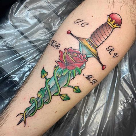 Rose and Dagger Tattoo Designs with Symbolic Meaning