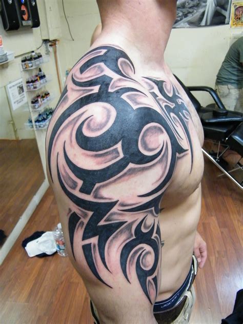 Top 7 Tribal Shoulder Tattoo Designs for Men