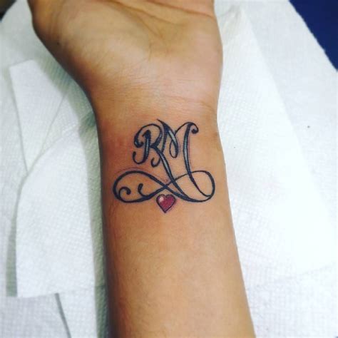 Simple Love Initials Tattoo Design