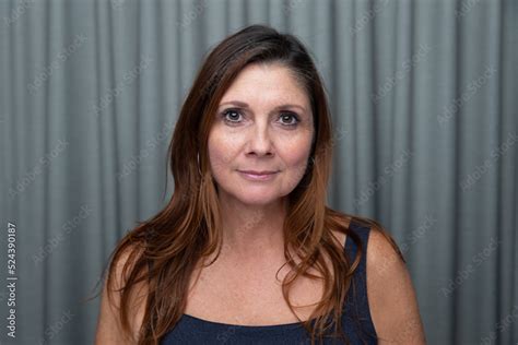 Simple Portrait Of A Beautiful Brunette Middle Aged 40 50 Year Old Woman With Long Hair