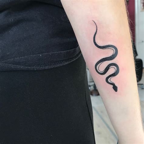 Simple Snake Tattoo Designs for Small Spaces