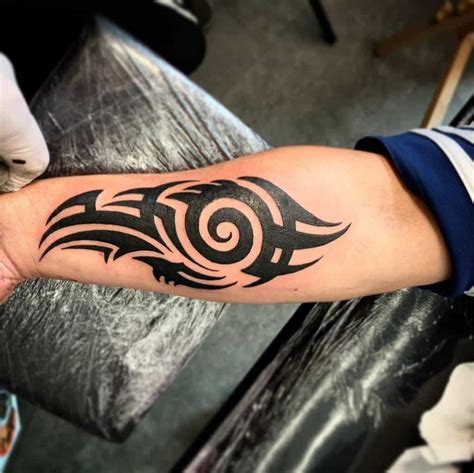 Simple Tribal Tattoo Designs for Men and Women