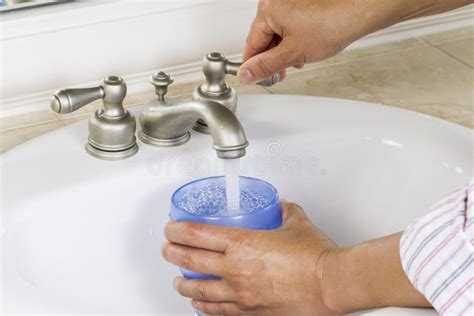 How to Properly Dispose of Sink Water in a Cup