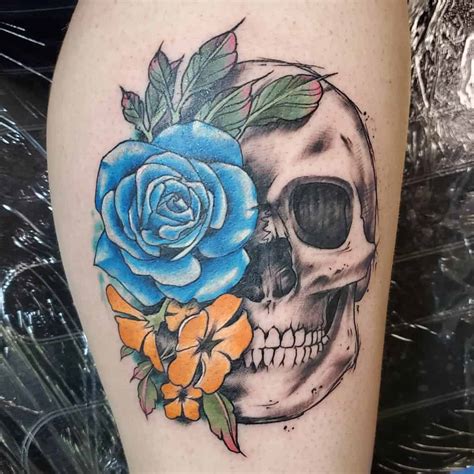 Small Skull And Flower Tattoos