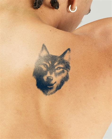 Small Wolf Face Tattoo Unleashing The Wildness In You