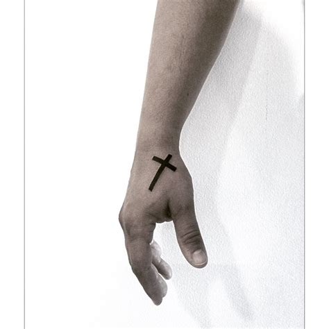 Solid Cross Tattoo On The Hand Tattoogrid Net