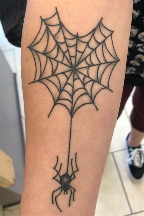 7 Symbolic Meanings of a Spider in a Web Tattoo