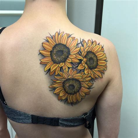 10 Sun Flower Tattoo Designs to Brighten Up Your Style