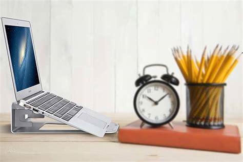 The Aluminum Laptop Stand Serves As Vertical Laptop Dock Gadgetsin