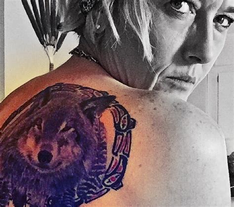 The Intriguing Symbolism Behind A Bear And Wolf Tattoo Explained