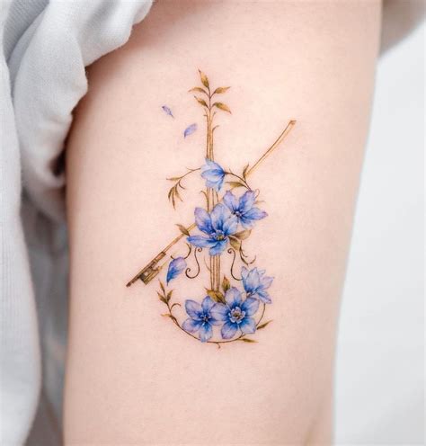 The Meaning Of Larkspur Tattoos A Symbolism Guide