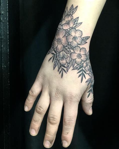 The Popularity Of Flower Tattoos On Hands In 2023 Ketofoodchart