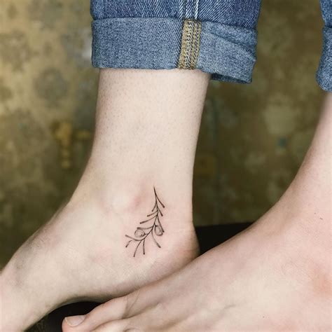 Tiny Foot Tattoo