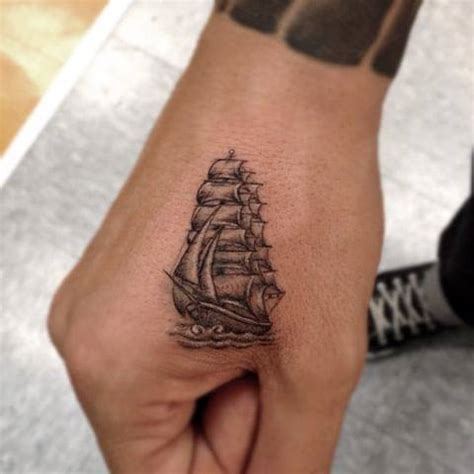 Tiny Sailing Ship Tattoo Locared On The Hand