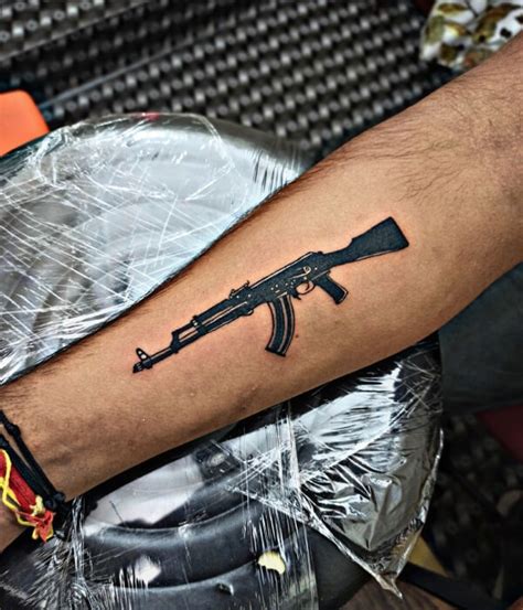 Top Ak 47 Tattoo Ideas Pictures Images And Stock Photos