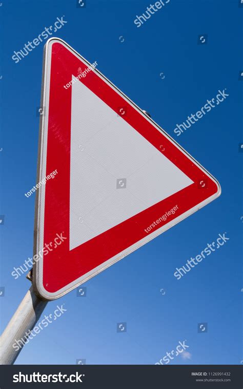 Traffic Signs Germany Yield To Cross Traffic Sign In Front Of A