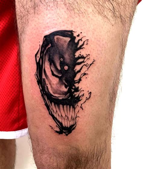 Exploring the Meaning Behind Venom Tattoo Designs