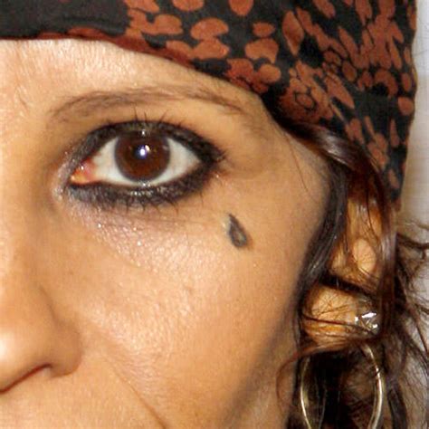 Woman Tear Drop Tattoo